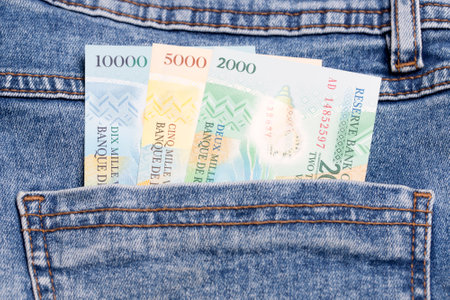 Vanuatu money - vatu in the pocket of blue jeansの写真素材