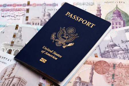American passport on Egyptian money - poundの写真素材