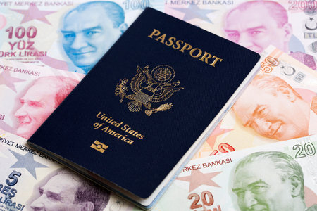 American passport on Turkish money - Liraの写真素材