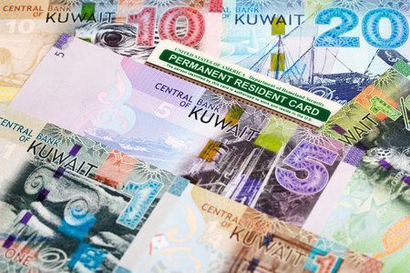 American permanent resident card on Kuwaiti money - Dinarの写真素材