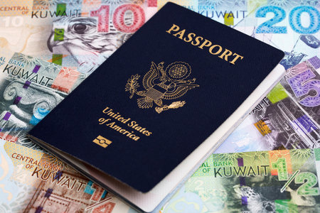 American passport on Kuwaiti money - Dinarの写真素材