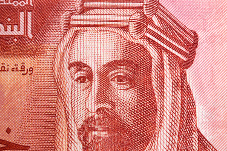 Abdullah I of Jordan a closeup portrait from Jordanian money - Dinarの写真素材
