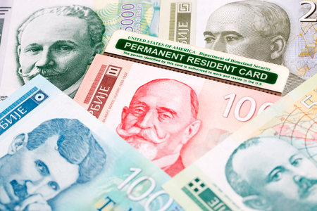 American Permanent Resident Card on Serbian money - dinarの写真素材