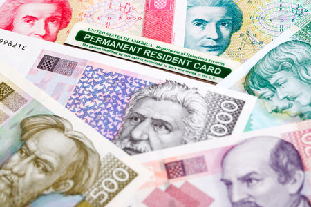 American Permanent Resident Card on Croatian money - kunaの写真素材