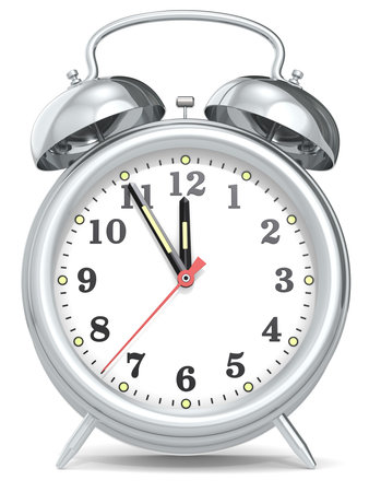 Classic alarm clock with hands at five to twelve. Metal.の写真素材