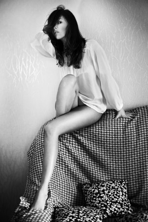 The Portrait of a white girl on the bedの写真素材