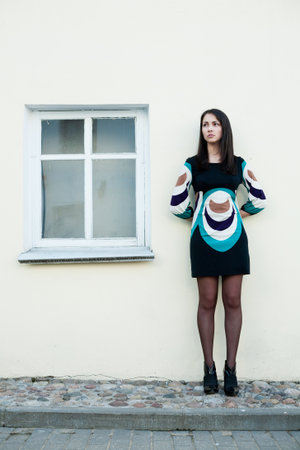 Young woman stand on the streetの写真素材