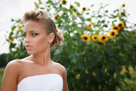 A beautiful bride in the white wedding dress.の写真素材