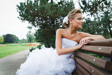 A beautiful bride in the white wedding dress.の写真素材