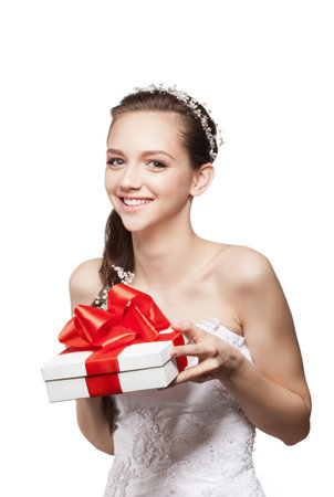 Beautiful elegance bride with small gift boxの写真素材