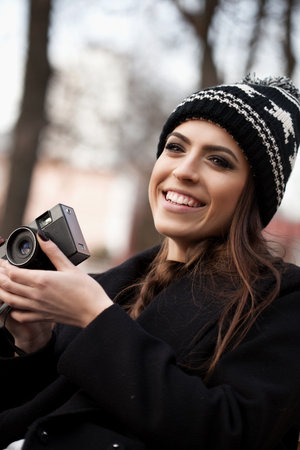 beautiful girl photographed in the old camera. Outdoor, lifestyle.