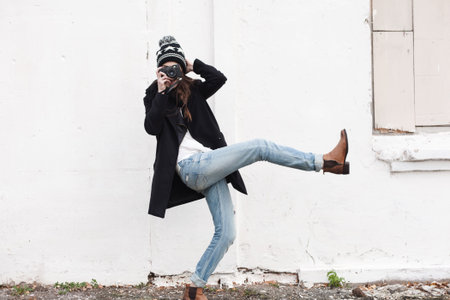 beautiful girl photographed in the old camera. Outdoor, lifestyle.の写真素材