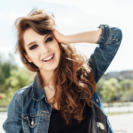 Outdoor portrait of beautiful young woman