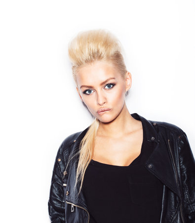 Stylish fashionable blonde woman in black clothes looking at camera.  White background, not isolatedの写真素材
