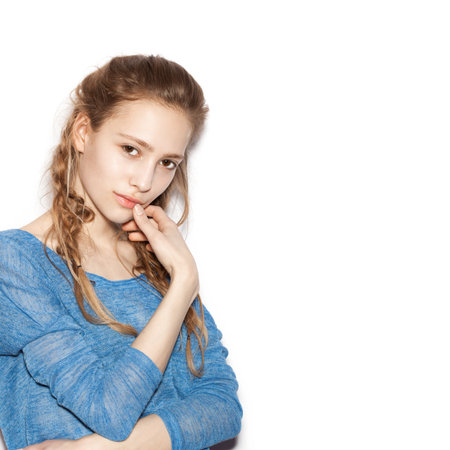 Beauty flirting woman. Portrait of teen girl beautiful cheerful enjoying with long brown hair and clean skin. Not isolated on white backgroundの写真素材