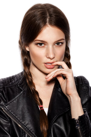 Hair Braid. Beautiful Woman with Healthy Long Brown Hair. Hairdressing. Hairstyle. Beauty Glamour Fashion Model Girl Portrait. Perfect Skin and Makeup Holiday Make up.の写真素材