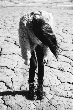 Portrait of the beautiful girl, the wind fluttering hair. Black white tonedの写真素材