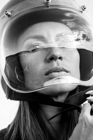 female biker girl button up open face motorcycle helmetの写真素材