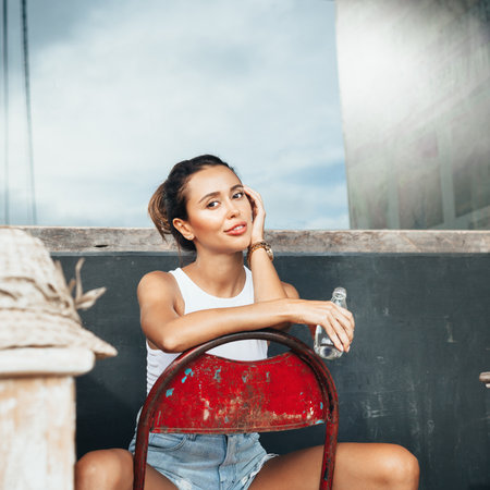 young beautiful happy positive woman on summer vacation in asiaの写真素材