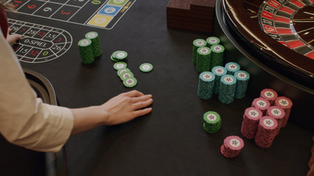 Dealer hadling chips at Casino
