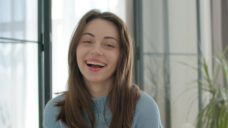 Pretty caucasian girl looking at cameraの写真素材