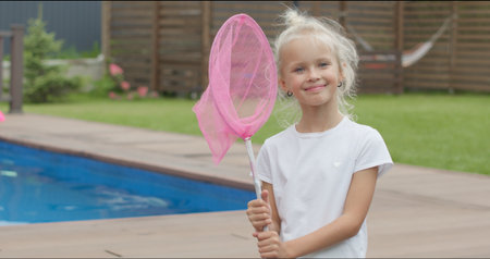 girl holding a soccer ballの写真素材
