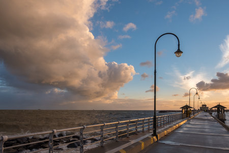 Beautiful and colorful sunset in St Kilda, Melbourne, Australiaの写真素材