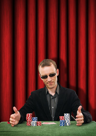 lucky man playing poker in casinoのeditorial素材