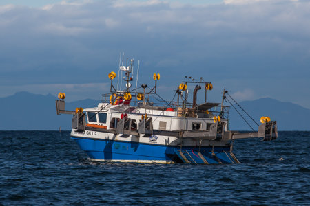 Iceland - August 11, 2017 : Commercial fishing boat 2714 Ãli GÃ­sla GK-112 at mackerel fishing in Icelandic waters.のeditorial素材