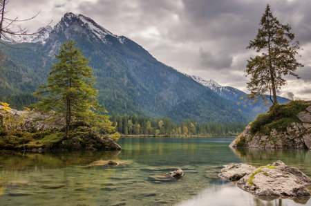 Reflections at the mountain lake in the alps