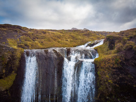 Iceland. Aerial view on the mountain, field, bridge and river. Landscape in the Iceland at the day time. Landscape from drone. Travel - imageの写真素材