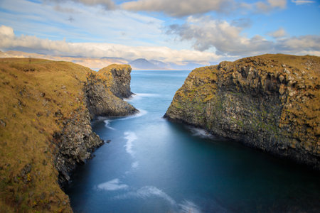 Gatklettur arch in Arnarstapi town in SnÃ¦fellsnes peninsula, West Iceland.