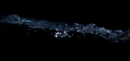 A wave on a black background