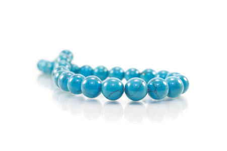 Turquoise necklace on white background. Isolated. Close-upの写真素材