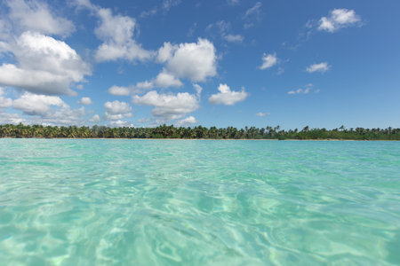 Seascape of turquoise water on a background of a beautiful sky.の写真素材