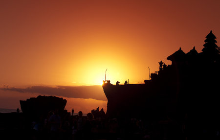 Silhouette view during sunset of Pura at Tanah Lot, Bali, Indonesiaの写真素材