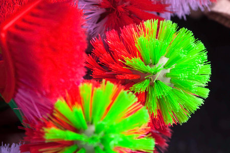 Toilet brush with red and green colorの写真素材