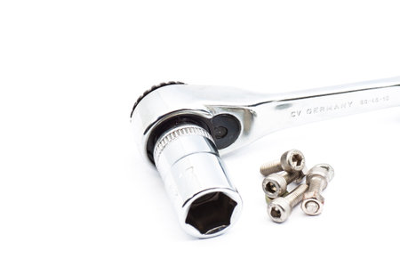 Ratchet Wrench and Allen Screw on isolated backgroundの写真素材