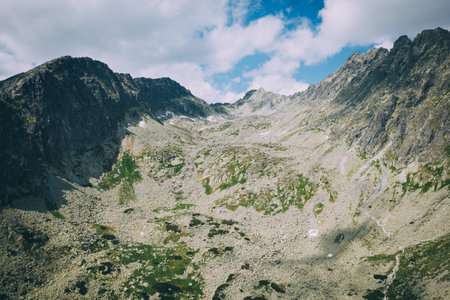 High Tatras mouintans from drone point of view. Rocky mountains, lakes, and sunny summer weather. It was nice travel trip to these europian mountains - National park. This is nearby Lomnicky stit and Kriva and Strbske pleso.の写真素材