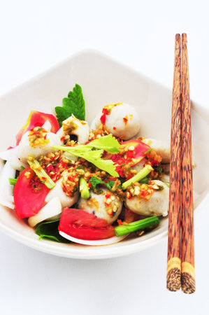 Hot and Spicy fish ball and Herb Thai styleの写真素材