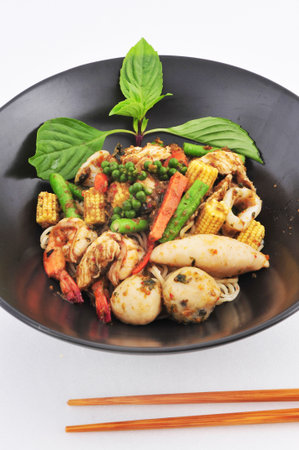 Hot and Spicy noodle with fishball and Herb  Thai style の写真素材