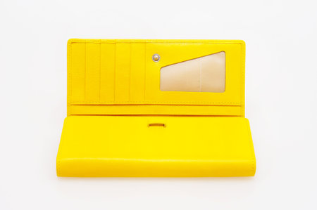 yellow purse on a white background の写真素材