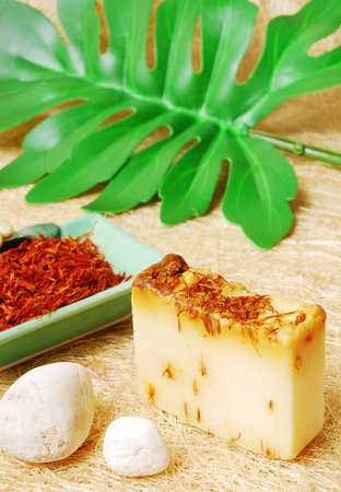 Spa setting with natural soaps の写真素材