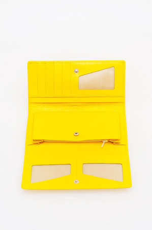 yellow purse on a white background の写真素材