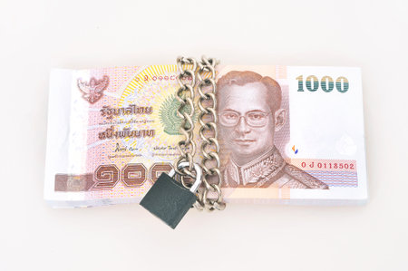 Cash Locked for Money Saving Insurance Concept の写真素材