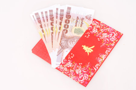 thai money in red envelope on white background  Chinese New Year の写真素材