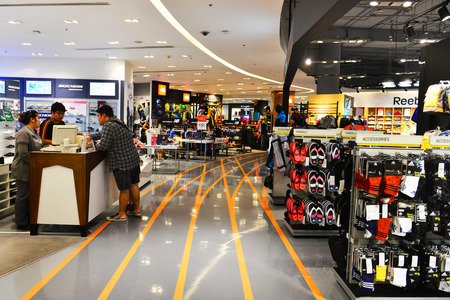 BANGKOK,THAILAND - June 5, 2014 : Sport zone clothing section in a supermarket Siam Paragon in Bangkok. With 300,000 sqm of retail space Siam Paragon is one of the world\'s largest malls.のeditorial素材