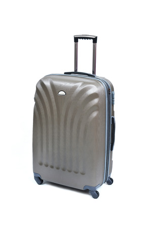Travel luggage isolated on the white backgroundの写真素材