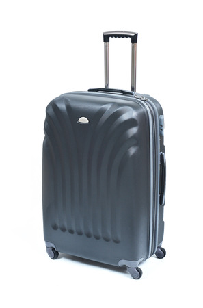 Travel luggage isolated on the white backgroundの写真素材