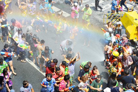 BANGKOK THAILAND  APRIL 15 2015: people playing water in Songkran festival on April 15 2015 at Silom road in Bangkokのeditorial素材